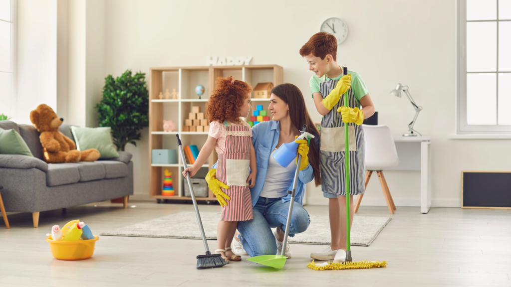 Woman and children cleaning